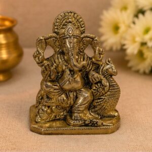 Premium Brass Ganesha Idol Seated Gracefully with a Peacock