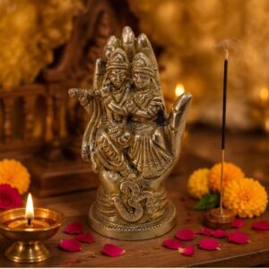 Handcrafted Brass Radha Krishna Idol Sitting on Protective Palm