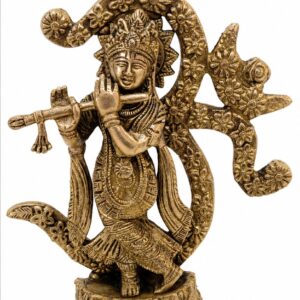 Brass Krishna Idol Playing Flute in Front of Ornate Floral Arch